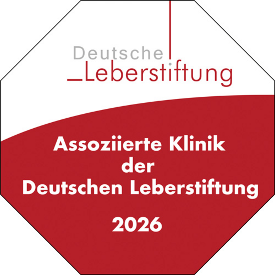 Achteckiges Signet der Deutschen Leberstiftung in Weiß und Rot