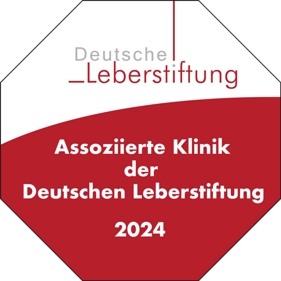 Achteckiges Signet der Deutschen Leberstiftung in Weiß und Rot